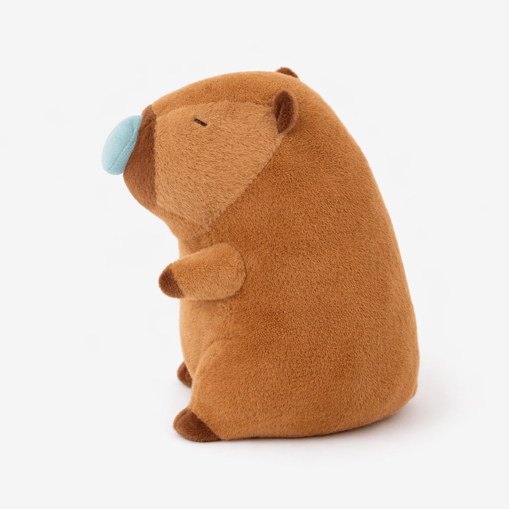kuscheltierland Braun / 23cm Schlafendes Capybara Kuscheltier mit blauer Nasenblase